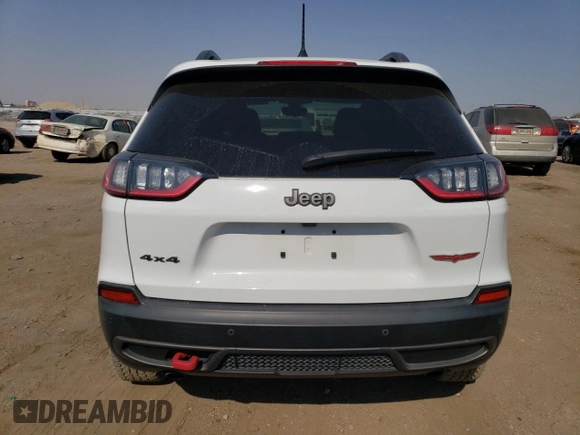2020 Jeep Cherokee Trailhawk Elite z VIN 1C4PJMBN3LD537812, wystawiony jako Copart lot #73635994 z przebiegiem 43 496 mil mil oraz Czysty tytuł • Clean title. Historia ofert i sprzedaży dostępna na DreamBid. Obrazek 6.