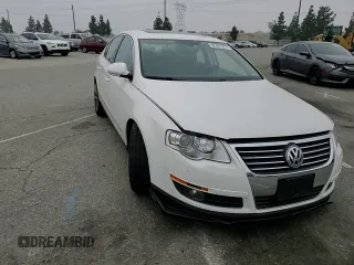 2008 Volkswagen Passat z VIN WVWCU73C58P028217, wystawiony jako Copart lot #52451275 z przebiegiem 70 829 mil mil oraz Szkoda całkowita • Salvage title. Historia ofert i sprzedaży dostępna na DreamBid. Obrazek 11.