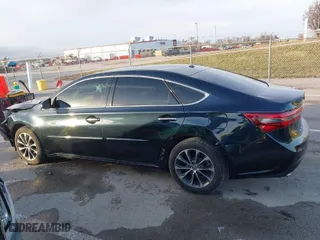 2016 Toyota Avalon Limited with VIN 4T1BK1EB8GU223792, listed as a IAAI auction lot 41115682 with 142,063 mi miles. Bid and sale history available at carsss.com. Image 14.