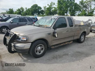 2002 Ford F-150 XL with VIN 1FTRX17L02KC02580, listed as a Copart auction lot 60859595 with 175,892 mi miles and Salvage title. Bid and sale history available at DreamBid. Image 1.