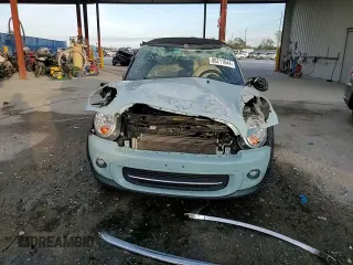 2012 MINI Convertible z VIN WMWZN3C59CT135351, wystawiony jako Copart lot #86711044 z przebiegiem 93 515 mil mil oraz Nie do naprawy • Non repairable. Historia ofert i sprzedaży dostępna na DreamBid. Obrazek 14.