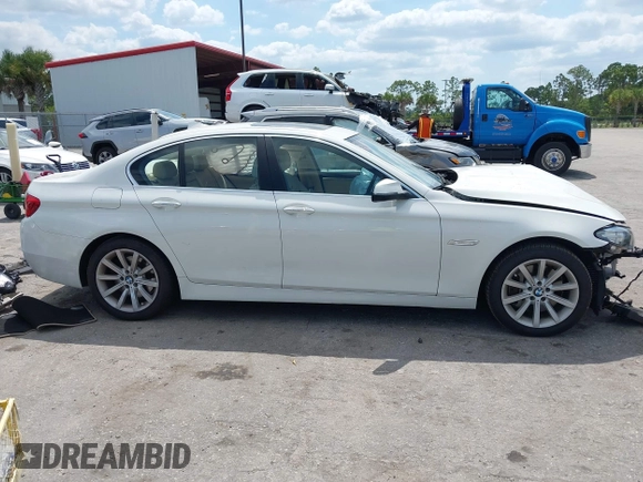 2014 BMW 5 Series 535i with VIN WBA5B1C56ED483780, listed as a IAAI auction lot 42308960 with 155,037 mi miles and . Bid and sale history available at DreamBid. Image 14.
