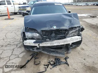 2003 BMW 3 Series 325xi with VIN WBAEU334X3PM56980, listed as a Copart auction lot 51082745 with 159,044 mi miles and Salvage Title. Bid and sale history available at carsss.com. Image 5.