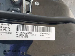 2014 Dodge Charger SXT Plus with VIN 2C3CDXJG2EH184239, listed as a IAAI auction lot 41912384 with 128,313 mi miles. Bid and sale history available at carsss.com. Image 9.