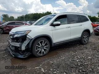 2020 Honda Pilot Touring 8-Passenger с VIN 5FNYF6H94LB007319, выставлен на аукционе Copart как лот 64173565 с пробегом Не указан миль и Списание • Salvage title. История ставок и продаж доступна на DreamBid. Изображение 1.