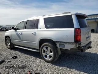 2015 Chevrolet Suburban LTZ with VIN 1GNSKKKC1FR120164, listed as a Copart auction lot 53700455 with 195,815 mi miles and Salvage Title. Bid and sale history available at DreamBid. Image 2.