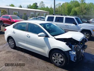2022 Kia Rio S with VIN 3KPA24AD7NE492807, listed as a IAAI auction lot 42050520 with 100,756 mi miles. Bid and sale history available at carsss.com. Image 1.