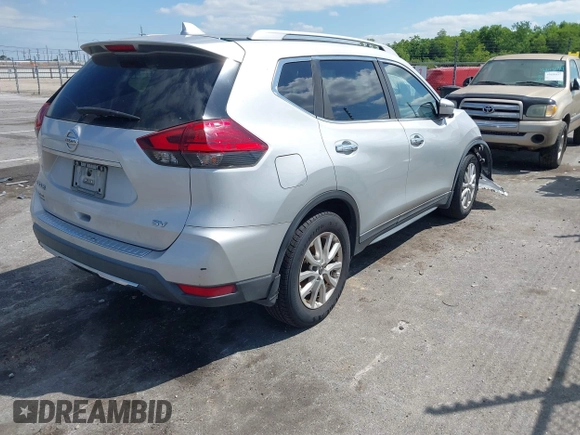 2017 Nissan Rogue S with VIN 5N1AT2MTXHC880965, listed as a IAAI auction lot 42016855 with 117,672 mi miles. Bid and sale history available at carsss.com. Image 4.