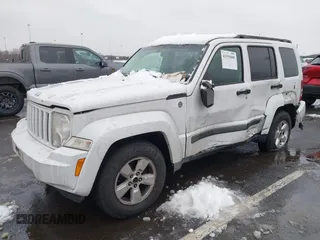 2011 Jeep Liberty Sport Jet with VIN 1J4PN2GK3BW587775, listed as a IAAI auction lot 41555089 with 126,921 mi miles and . Bid and sale history available at DreamBid. Image 2.