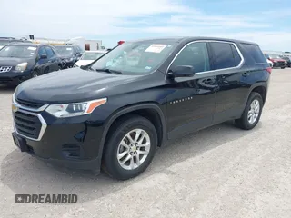 2019 Chevrolet Traverse LS z VIN 1GNERFKWXKJ301749, wystawiony jako IAAI lot #42017638 z przebiegiem 98 408 mil mil oraz . Historia ofert i sprzedaży dostępna na DreamBid. Obrazek 2.