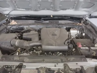 2021 Toyota Tacoma SR5 z VIN 3TMDZ5BN5MM114494, wystawiony jako IAAI lot #41723032 z przebiegiem 54 477 mil mil oraz . Historia ofert i sprzedaży dostępna na DreamBid. Obrazek 10.