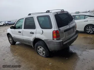 2001 Ford Escape XLS with VIN 1FMYU01191KA29996, listed as a Copart auction lot 86362534 with 265,271 mi miles and Salvage Title. Bid and sale history available at carsss.com. Image 2.