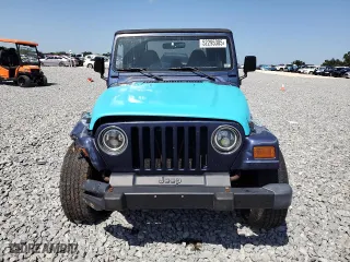 1997 Jeep Wrangler SE with VIN 1J4FY29P2VP446786, listed as a Copart auction lot 52295305 with 0 mi miles and Salvage Title. Bid and sale history available at carsss.com. Image 5.