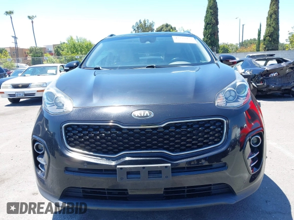 2019 Kia Sportage EX with VIN KNDPN3AC2K7602435, listed as a IAAI auction lot 42233427 with 58,730 mi miles and . Bid and sale history available at DreamBid. Image 12.