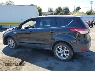 2013 Ford Escape SEL with VIN 1FMCU9H94DUC94456, listed as a Copart auction lot 63872645 with 177,099 mi miles and Salvage title. Bid and sale history available at DreamBid. Image 2.