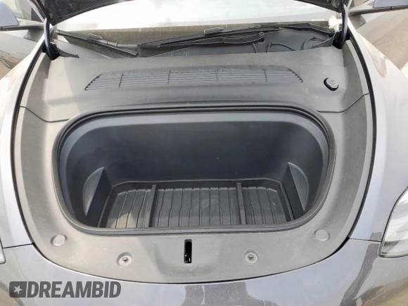 2024 Tesla Model Y Long Range with VIN 7SAYGDEE2RA287446, listed as a Copart auction lot 57640895 with 27,932 mi miles and Salvage title. Bid and sale history available at DreamBid. Image 11.