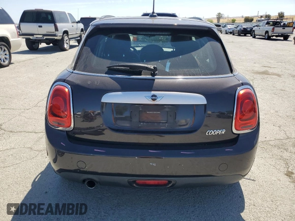 2015 MINI Hardtop 4 Door z VIN WMWXS5C57FT829133, wystawiony jako Copart lot #58764405 z przebiegiem 63 774 mil mil oraz Szkoda całkowita • Salvage title. Historia ofert i sprzedaży dostępna na DreamBid. Obrazek 6.