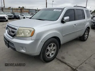 2009 Honda Pilot Touring z VIN 5FNYF38829B007673, wystawiony jako Copart lot #58963085 z przebiegiem 211 963 mil mil oraz Czysty tytuł • Clean title. Historia ofert i sprzedaży dostępna na DreamBid. Obrazek 1.