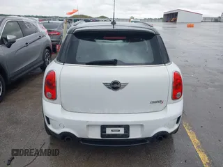 2013 MINI Countryman S ALL4 with VIN WMWZC5C50DWP30199, listed as a IAAI auction lot 42399104 with 103,367 mi miles and . Bid and sale history available at DreamBid. Image 13.