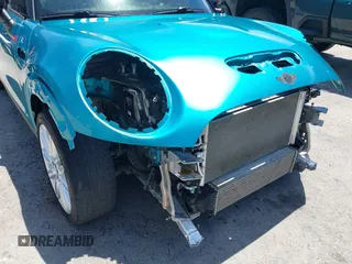 2017 MINI Convertible Cooper S z VIN WMWWG9C30H3C80917, wystawiony jako IAAI lot #42227320 z przebiegiem 38 490 mil mil oraz . Historia ofert i sprzedaży dostępna na DreamBid. Obrazek 19.