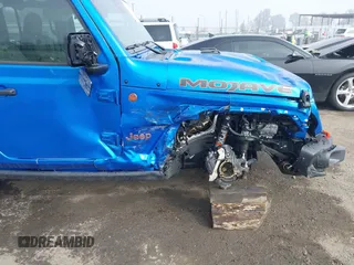 2024 Jeep Gladiator Mojave X z VIN 1C6JJTEG5RL121313, wystawiony jako IAAI lot #41013599 z przebiegiem 2 952 mil mil oraz . Historia ofert i sprzedaży dostępna na DreamBid. Obrazek 20.