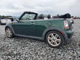 2012 MINI Convertible with VIN WMWZN3C50CT134069, listed as a Copart auction lot 56524155 with 106,480 mi miles and Clean title. Bid and sale history available at DreamBid. Image 2.