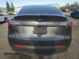 2024 Tesla Model Y with VIN 7SAYGDED7RF056973, listed as a Copart auction lot 87139214 with 15,391 mi miles and Salvage Title. Bid and sale history available at DreamBid. Image 6.