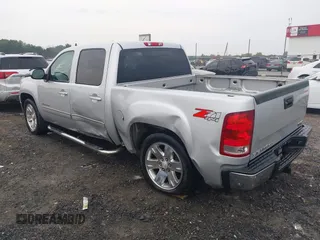 2013 GMC Sierra 1500 SLT with VIN 3GTP2WE74DG115414, listed as a IAAI auction lot 42441966 with 291,605 mi miles and . Bid and sale history available at DreamBid. Image 3.