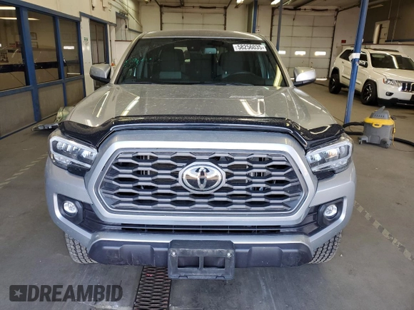 2023 Toyota Tacoma SR5 z VIN 3TMDZ5BNXPM165719, wystawiony jako Copart lot #58256035 z przebiegiem 13 681 mil mil oraz Szkoda całkowita • Salvage title. Historia ofert i sprzedaży dostępna na DreamBid. Obrazek 5.