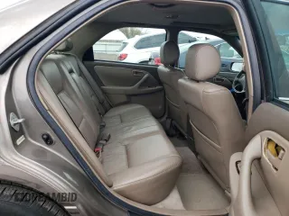 1999 Toyota Camry LE z VIN JT2BF28K6X0215555, wystawiony jako Copart lot #52587985 z przebiegiem 201 225 mil mil oraz Szkoda całkowita • Salvage title. Historia ofert i sprzedaży dostępna na DreamBid. Obrazek 10.