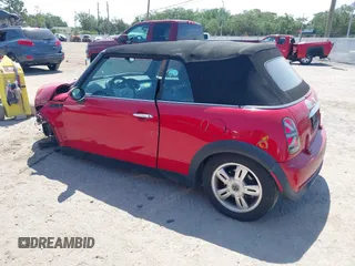 2006 MINI Convertible with VIN WMWRF33556TG14466, listed as a IAAI auction lot 42096368 with 120,230 mi miles and . Bid and sale history available at DreamBid. Image 3.