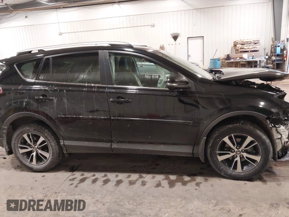 2018 Toyota RAV4 XLE with VIN 2T3RFREV3JW817989, listed as a IAAI auction lot 41636957 with 182,265 mi miles. Bid and sale history available at carsss.com. Image 14.