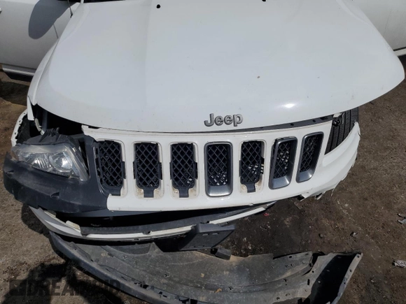 2016 Jeep Compass Sport with VIN 1C4NJDBB7GD725574, listed as a Copart auction lot 58993135 with Not provided miles and Salvage title. Bid and sale history available at DreamBid. Image 13.