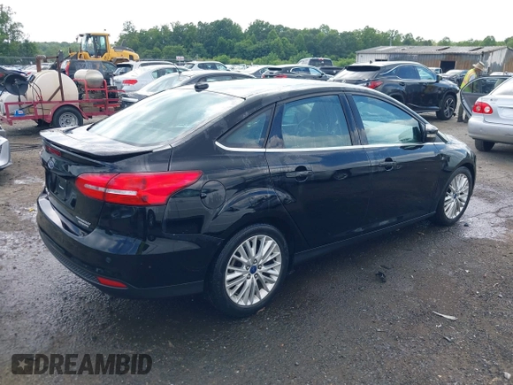 2016 Ford Focus Titanium z VIN 1FADP3J27GL215436, wystawiony jako IAAI lot #42709166 z przebiegiem 75 956 mil mil oraz . Historia ofert i sprzedaży dostępna na DreamBid. Obrazek 4.