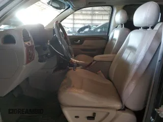 2006 GMC Envoy Denali with VIN 1GKES63M662302685, listed as a Copart auction lot 74315054 with 80,134 mi miles and Salvage Title. Bid and sale history available at carsss.com. Image 7.