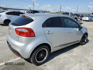 2012 Kia Rio LX with VIN KNADM5A37C6092993, listed as a Copart auction lot 48458034 with 108,314 mi miles and Salvage Title. Bid and sale history available at DreamBid. Image 3.