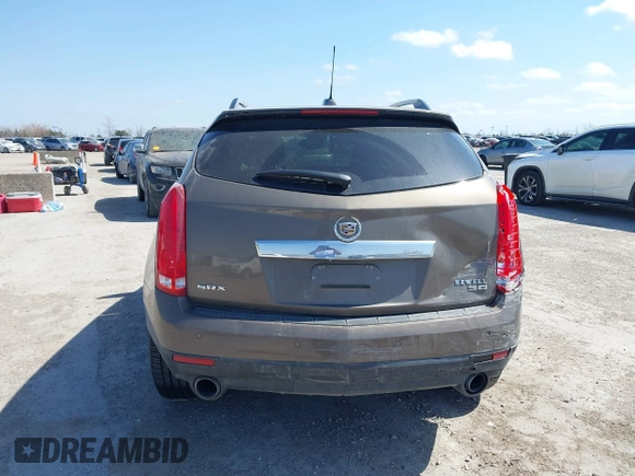 2015 Cadillac SRX Performance Collection with VIN 3GYFNCE31FS598109, listed as a IAAI auction lot 41788267 with 172,488 mi miles and . Bid and sale history available at DreamBid. Image 16.