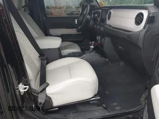 2023 Jeep Gladiator Overland with VIN 1C6JJTFM9PL593659, listed as a IAAI auction lot 42470253 with 34,374 mi miles and . Bid and sale history available at DreamBid. Image 5.