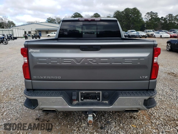2021 Chevrolet Silverado 1500 LTZ with VIN 1GCUYGED4MZ141587, listed as a Copart auction lot 46454205 with 98,470 mi miles and Salvage Title. Bid and sale history available at DreamBid. Image 6.