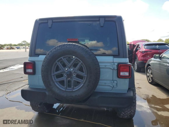 2024 Jeep Wrangler Willys with VIN 1C4PJXDN9RW151522, listed as a Copart auction lot 73929494 with 14,248 mi miles and Salvage Title. Bid and sale history available at carsss.com. Image 6.