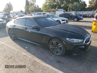 2020 BMW 8 Series 840i with VIN WBAGV4C06LCE28998, listed as a Copart auction lot 48566634 with 54,946 mi miles and Salvage title. Bid and sale history available at DreamBid. Image 4.
