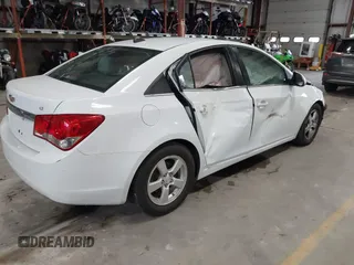 2014 Chevrolet Cruze 1LT with VIN 1G1PC5SB2E7182213, listed as a IAAI auction lot 40787686 with 129,882 mi miles and . Bid and sale history available at DreamBid. Image 4.