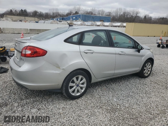 2012 Ford Fiesta SE with VIN 3FADP4BJ5CM170288, listed as a Copart auction lot 49471605 with 104,851 mi miles and Salvage Title. Bid and sale history available at DreamBid. Image 3.