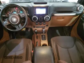 2015 Jeep Wrangler Unlimited Rubicon with VIN 1C4BJWFG3FL653961, listed as a Copart auction lot 47497135 with 97,707 mi miles and Clean title. Bid and sale history available at DreamBid. Image 8.