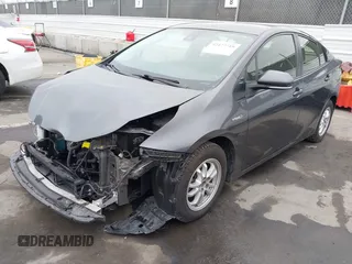 2021 Toyota Prius L Eco with VIN JTDKAMFU8M3144391, listed as a IAAI auction lot 42477718 with 314,346 mi miles and . Bid and sale history available at DreamBid. Image 18.