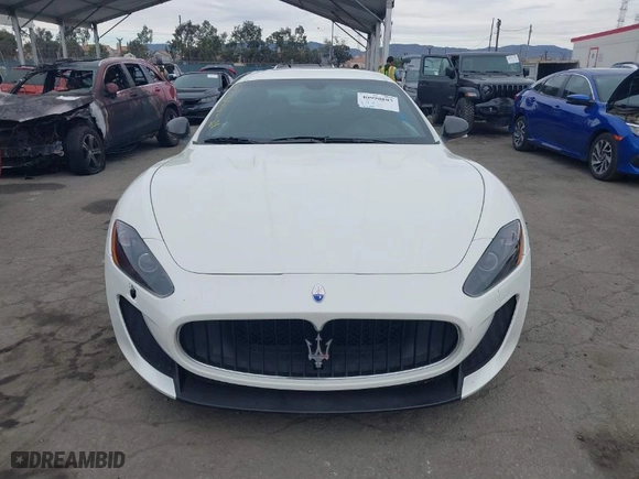 2012 Maserati GranTurismo MC Stradale with VIN ZAM45MLA9C0065671, listed as a IAAI auction lot 40990883 with 27,041 mi miles. Bid and sale history available at carsss.com. Image 12.