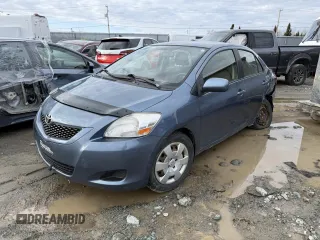 2012 Toyota Yaris z VIN JTDBT4K35CL033707, wystawiony jako Copart lot #53862155 z przebiegiem 102 277 mil mil oraz Szkoda całkowita • Salvage title. Historia ofert i sprzedaży dostępna na DreamBid. Obrazek 1.
