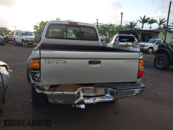 2003 Toyota Tacoma PreRunner z VIN 5TEGN92N63Z170929, wystawiony jako IAAI lot #41778256 z przebiegiem 202 135 mil mil oraz . Historia ofert i sprzedaży dostępna na DreamBid. Obrazek 16.