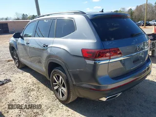 2021 Volkswagen Atlas SE z VIN 1V2DP2CA3MC518670, wystawiony jako IAAI lot #41860811 z przebiegiem 69 270 mil mil oraz . Historia ofert i sprzedaży dostępna na DreamBid. Obrazek 3.