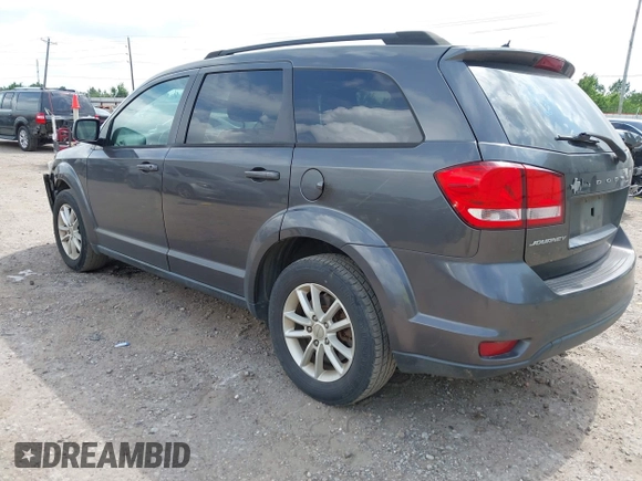 2017 Dodge Journey SXT z VIN 3C4PDCBB9HT507917, wystawiony jako IAAI lot #42322823 z przebiegiem 131 011 mil mil oraz . Historia ofert i sprzedaży dostępna na DreamBid. Obrazek 3.